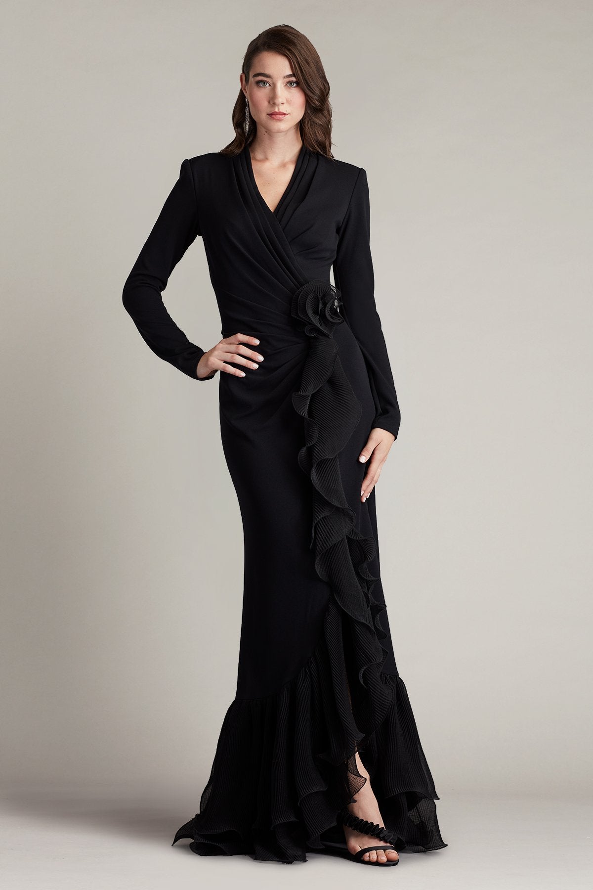 black long sleeve ruffle dress Ava Maxi Complement the dress with a pair of pointy toe leather flats for a more casual ensemble or elevate your style with heels for the romantic dinner night Malone Cascading Ruffle Gown -