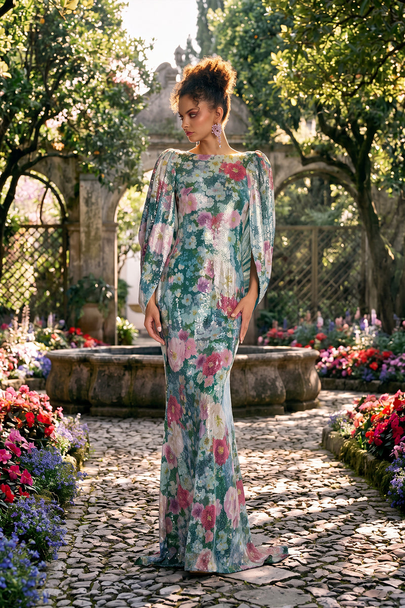TEA LEAF GARDEN PRINT MESH WITH SHIMMERING PAILLETTE OVERLAY CAPE GOWN WITH DRAPED OPEN BACK DETAIL