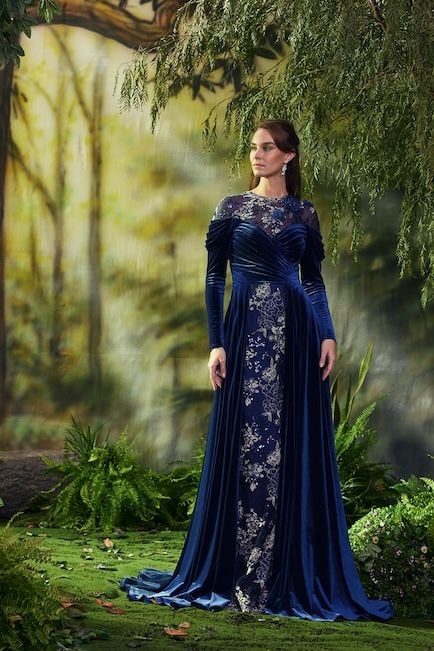 MIDNIGHT DRAPED VELVET AND BLOOMING PAILLETTE EMBROIDERED TULLE LONG SLEEVE GOWN WITH 3D FLORAL APPLIQUE DETAIL