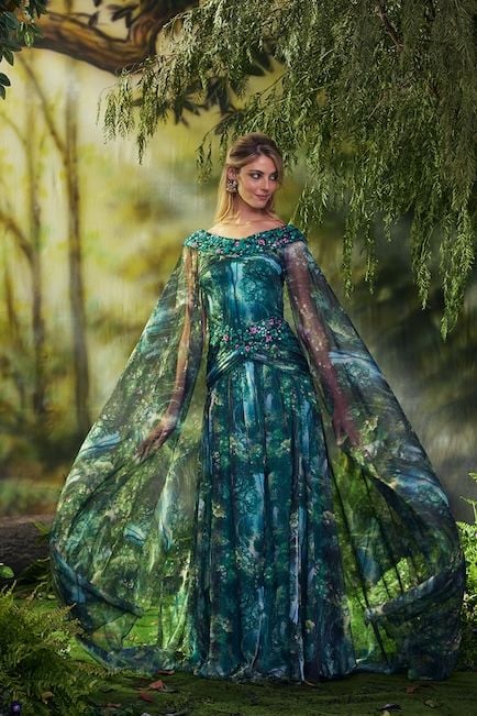 EMERALD WOODLAND PRINT CHIFFON HALTER GOWN WITH MICRO PAILLETTE EMBROIDERED APPLIQUE DETAIL AND SWEEPING CAPE