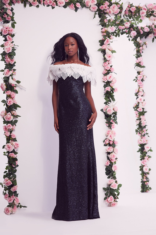 IVORY/NAVY MICRO PAILLETTE KNIT JERSEY OFF-THE-SHOULDER MODIFIED A-LINE GOWN WITH FEATHER CROCHET LACE RUFFLE DETAIL