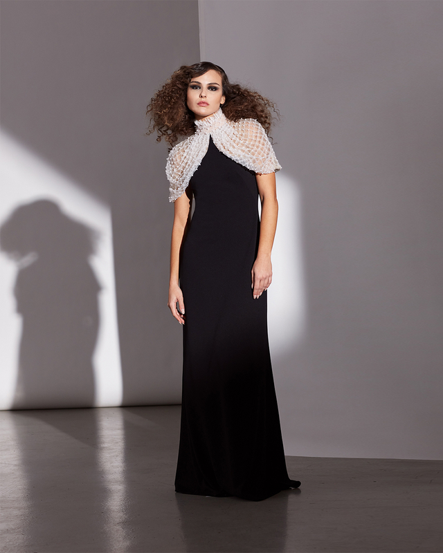 IVORY/BLACK CREPE GOWN WITH PEARL-EMBELLISHED SMOCKED TULLE STAND-UP COLLAR AND DRAPED SLEEVES