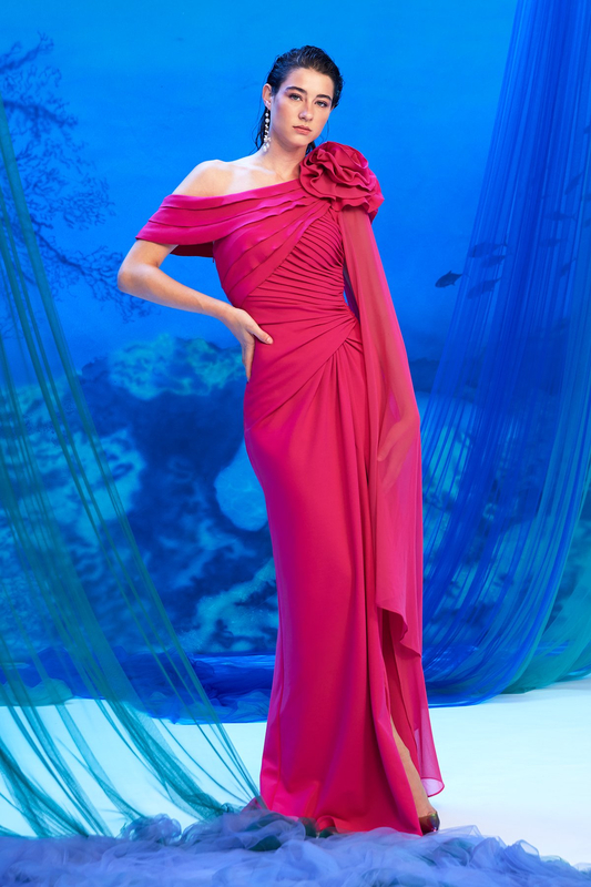 WATER LILY TEXTURED CREPE ONE-SHOULDER DRAPED GOWN WITH STATEMENT ROSETTE SHOULDER AND FABRIC CAPE SLEEVE